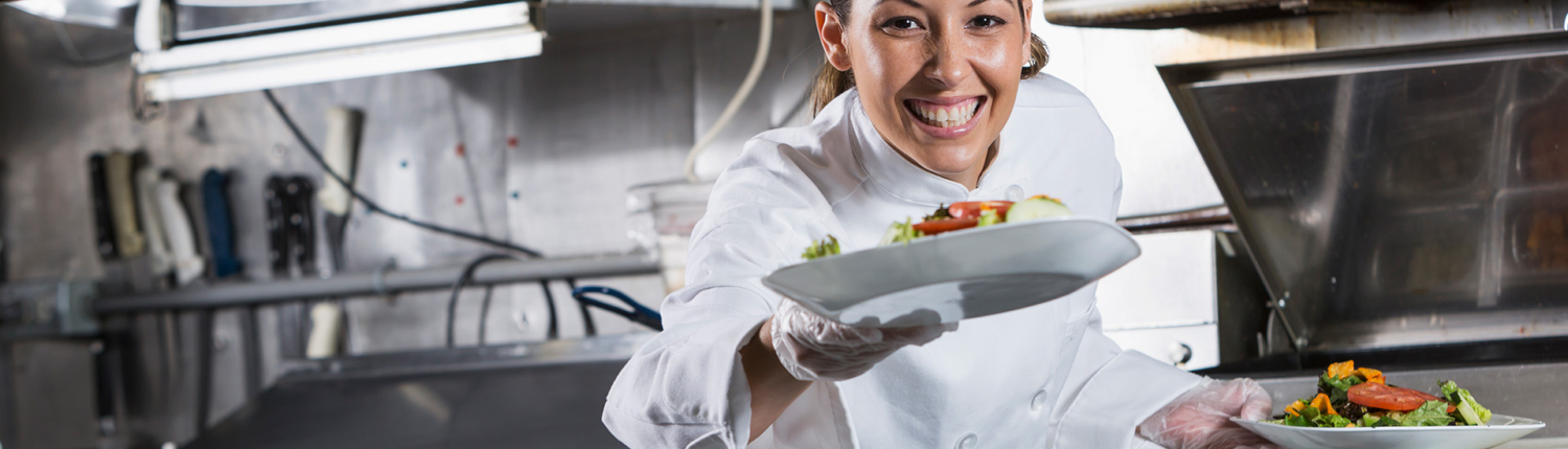 chef serving salads on white plates- New Perspective Careers Assisted Living Careers