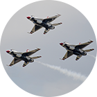 three military jets flying in the sky - New Perspective Careers Assisted Living Careers