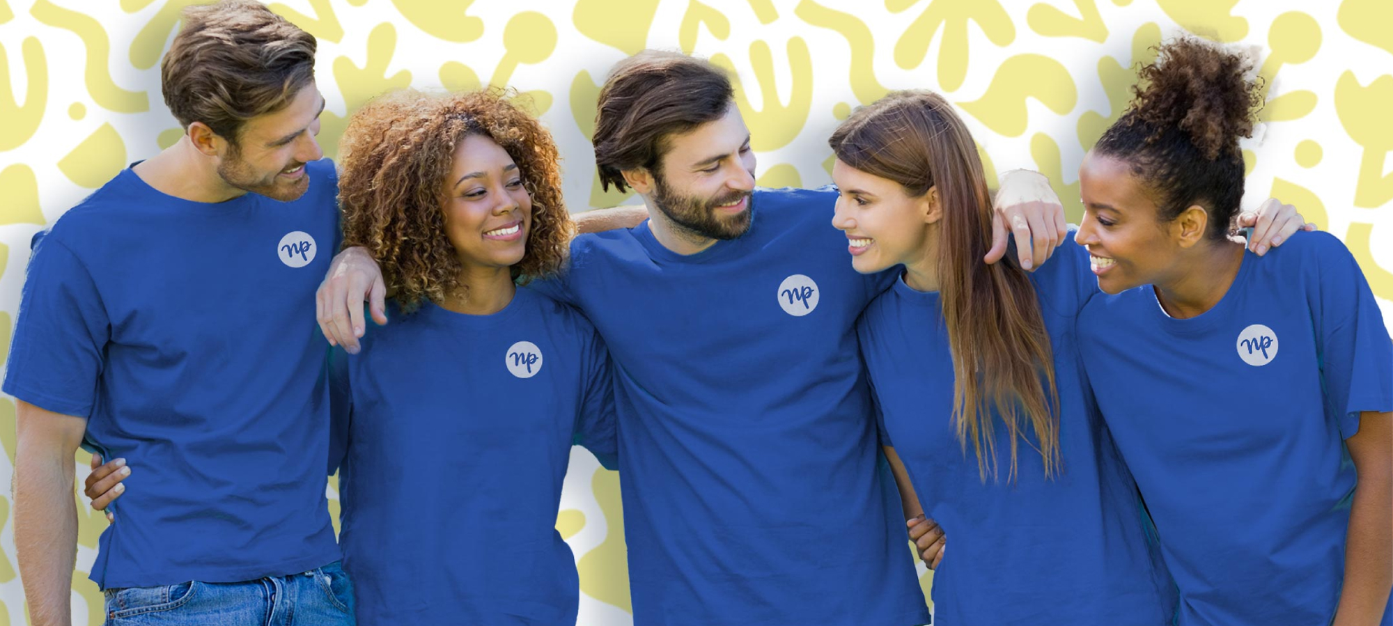 group of employees wearing royal blue shirts - New Perspective Careers Assisted Living Careers