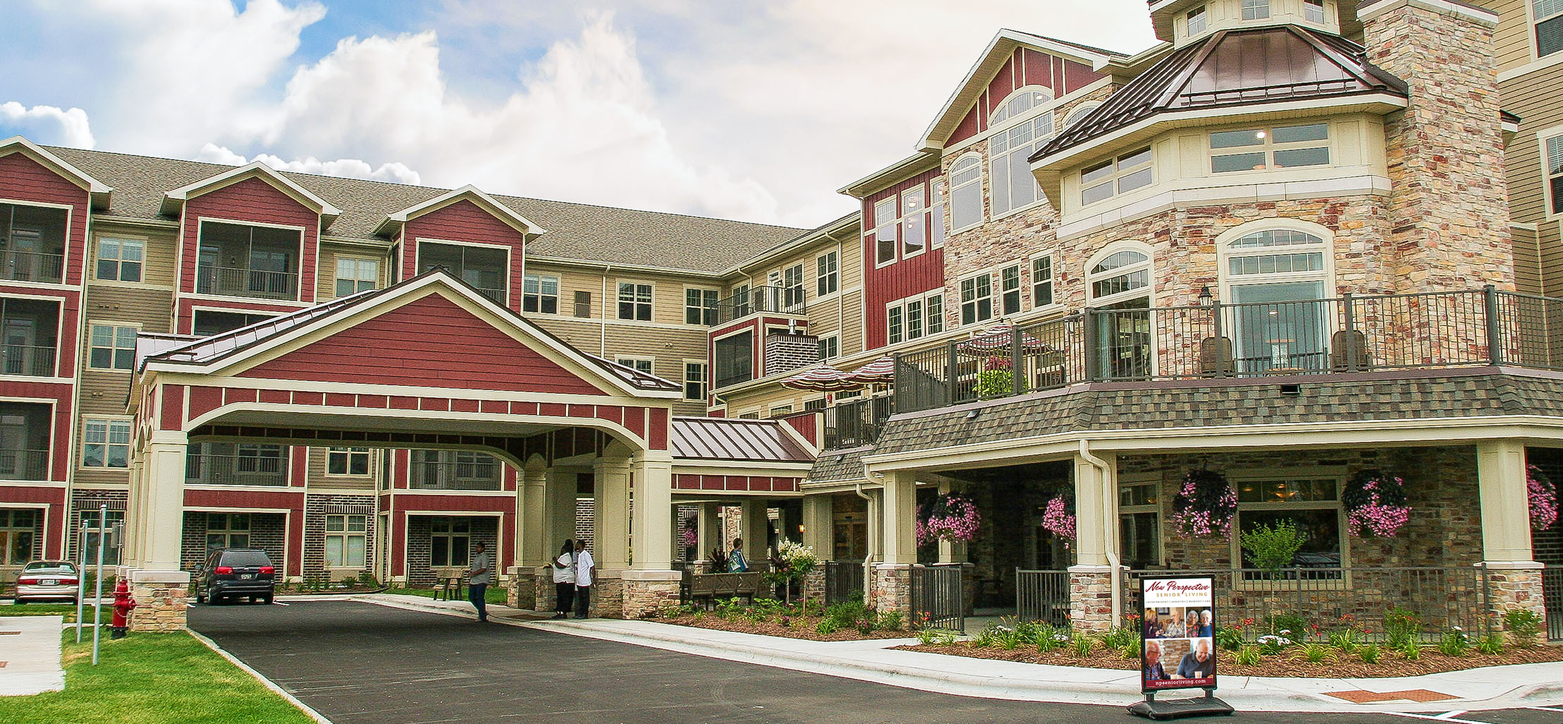 exterior of North Shore facility with stone and red siding - New Perspective Careers Assisted Living Careers